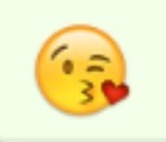 Emoticono Cara que manda un beso con un corazón