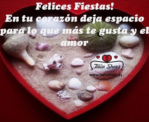 felices fiestas con forma de corazón